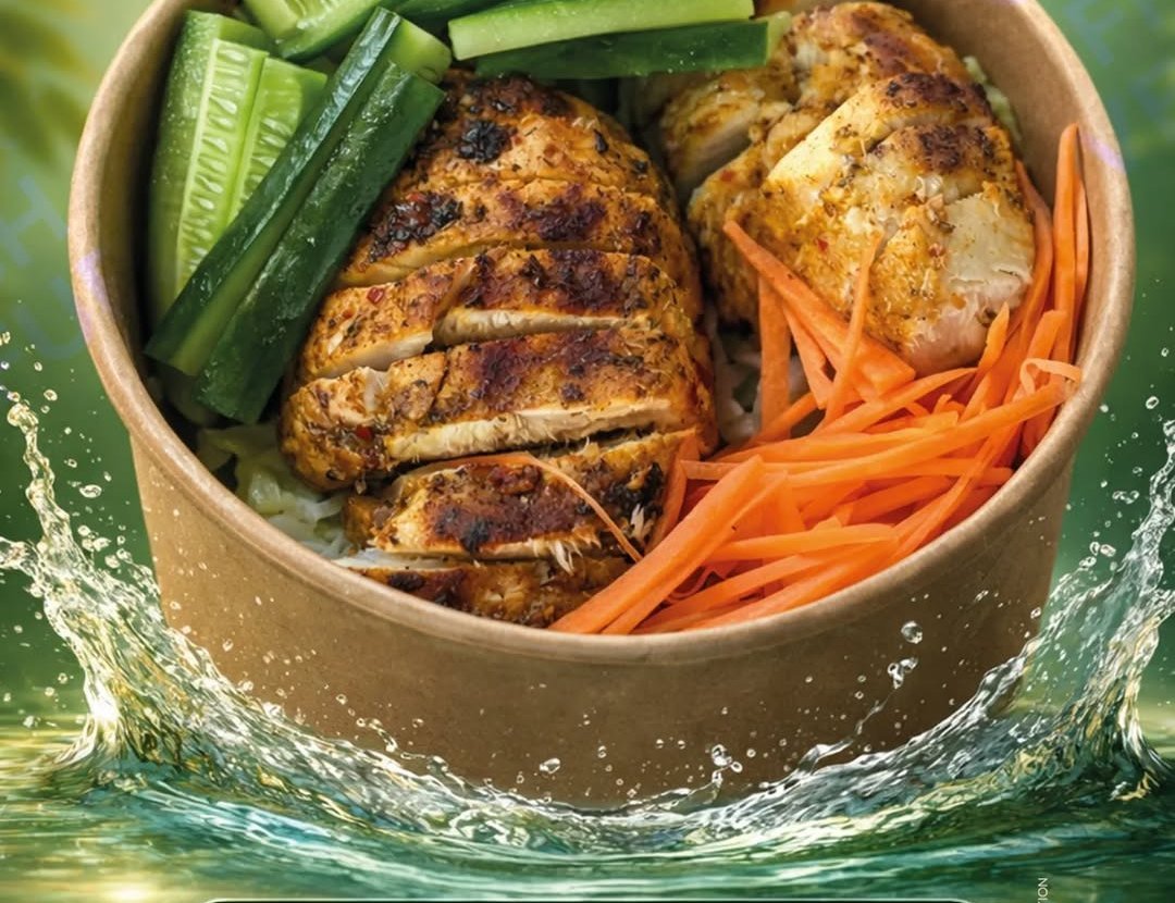 Grita protein rice bowl with grilled chicken, cucumber and carrots